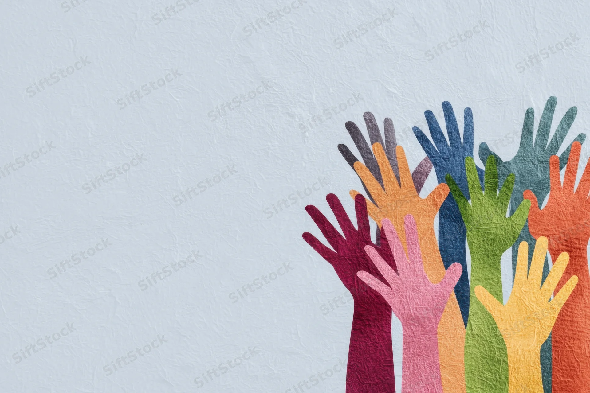 Multicolored hands reaching upward on textured light background with copyspace