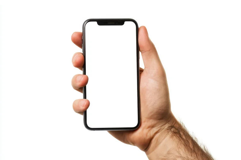Hand holding smartphone with blank screen against white background