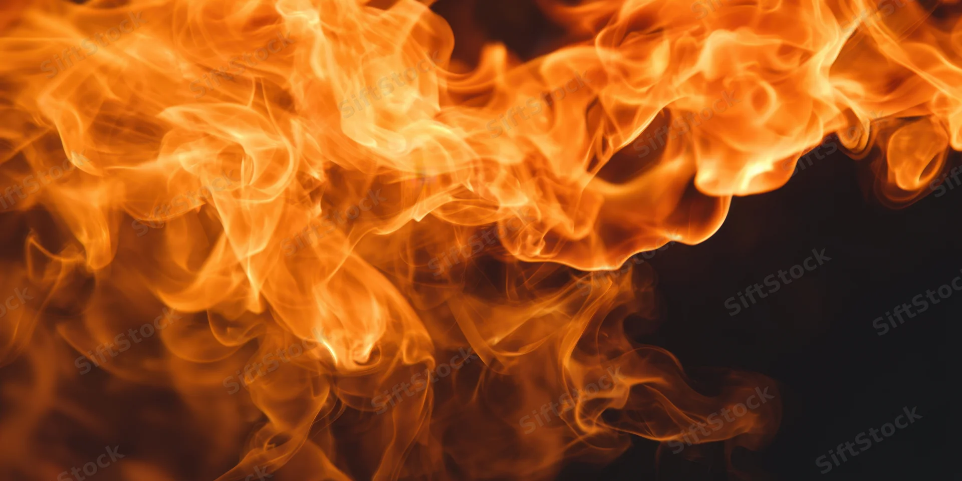 Swirling orange and amber flames against a dark background