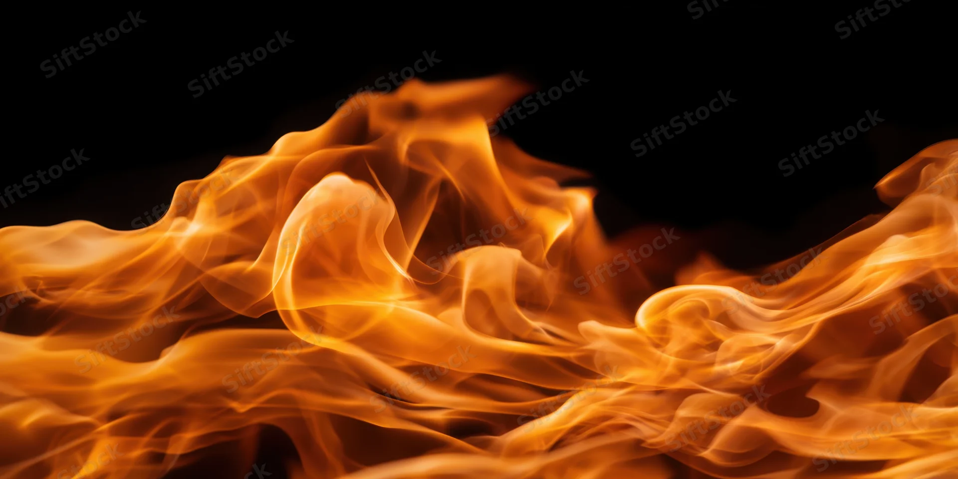 Swirling flames in motion against a dark background