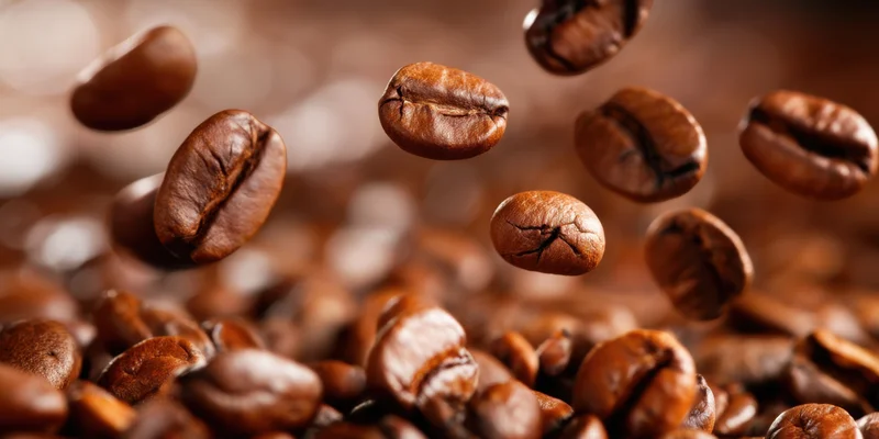 Roasted coffee beans floating in midair closeup macro view