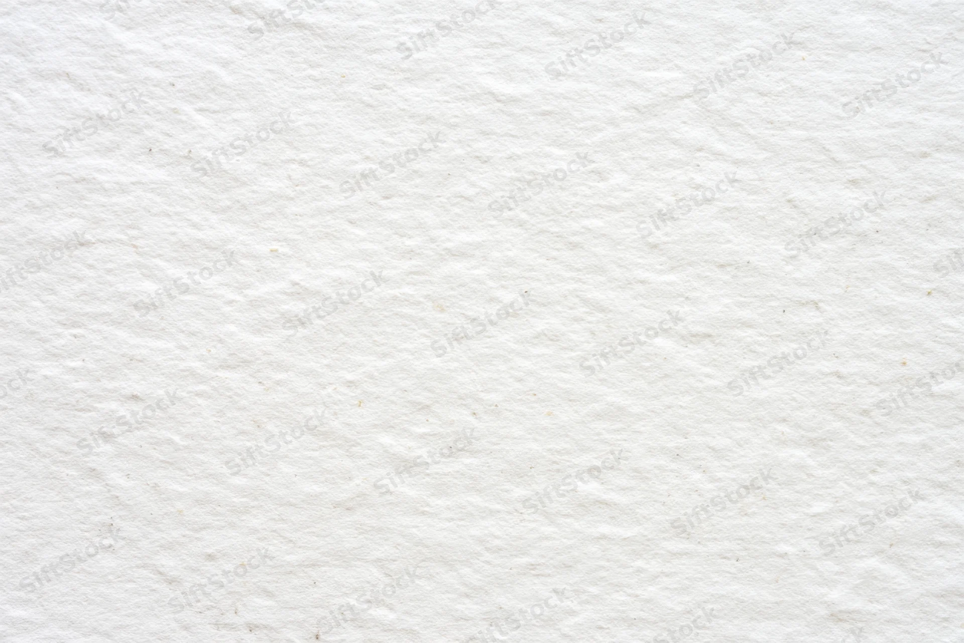 Textured off-white paper surface filling the frame as a neutral background