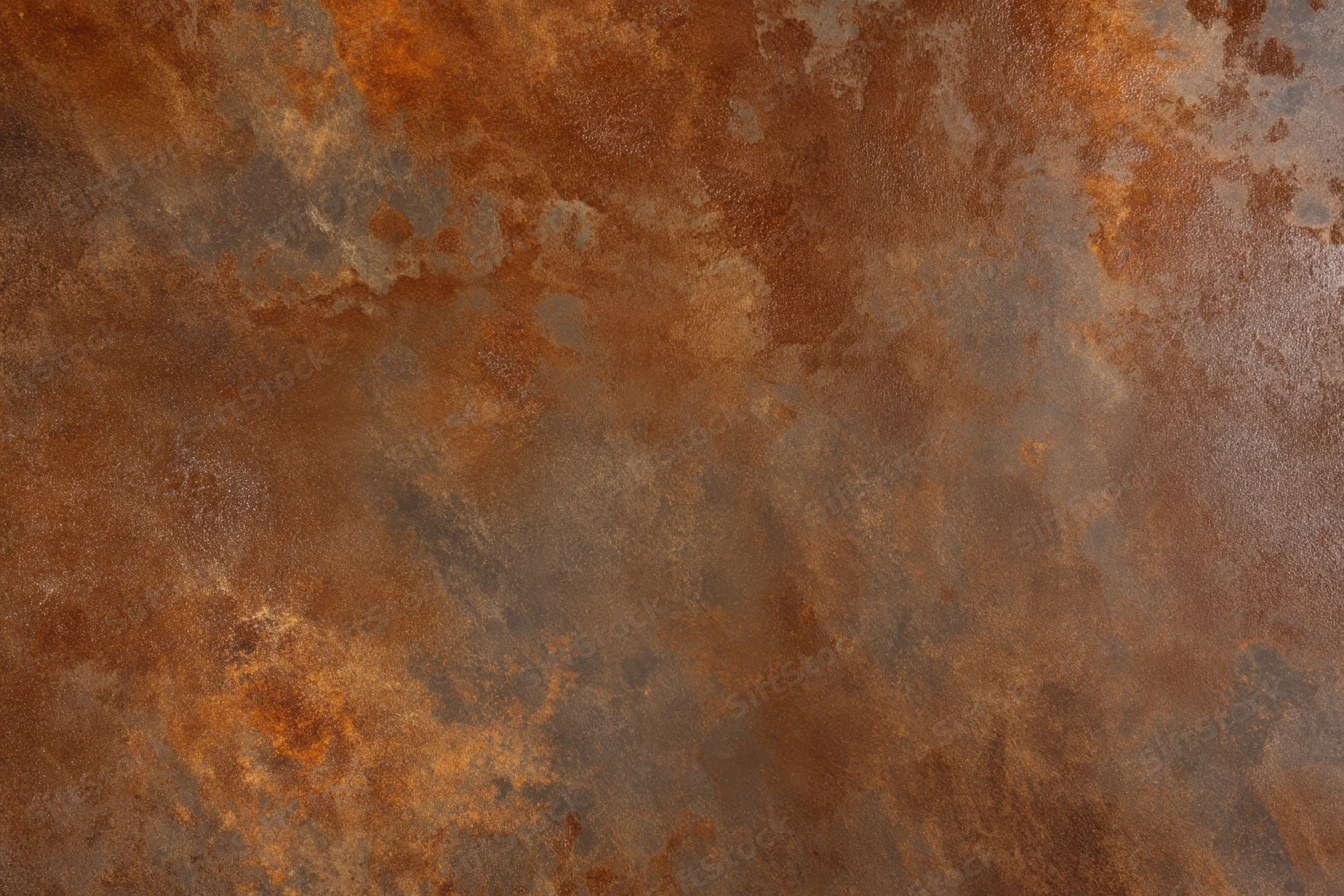 Weathered rusted metal surface with mottled brown and orange patches