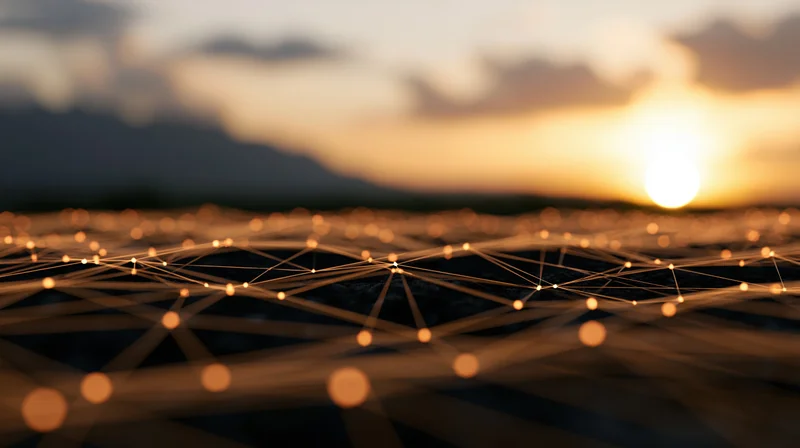 Glowing geometric network grid of interconnected nodes and lines over a sunset landscape