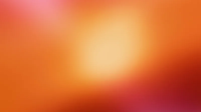 Smooth orange and red gradient background with soft light glow