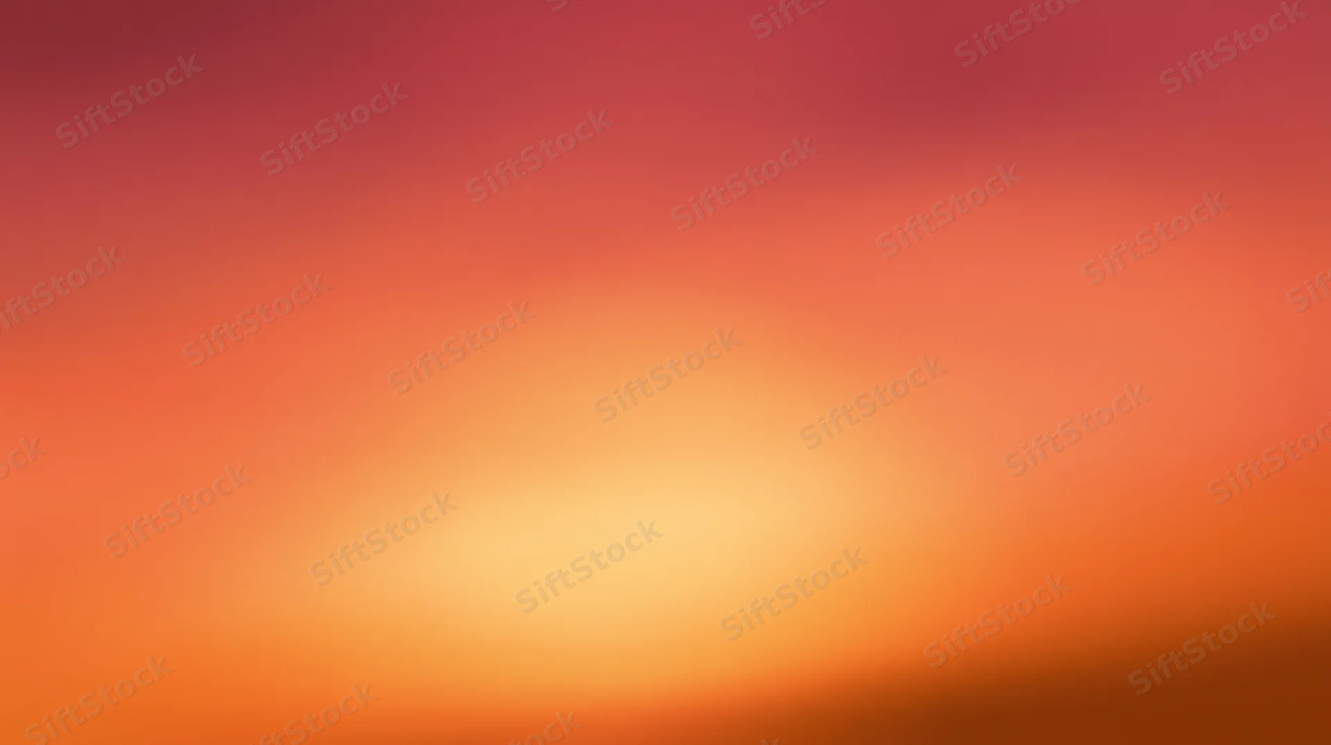 Smooth gradient of warm orange and pink hues blending across the frame