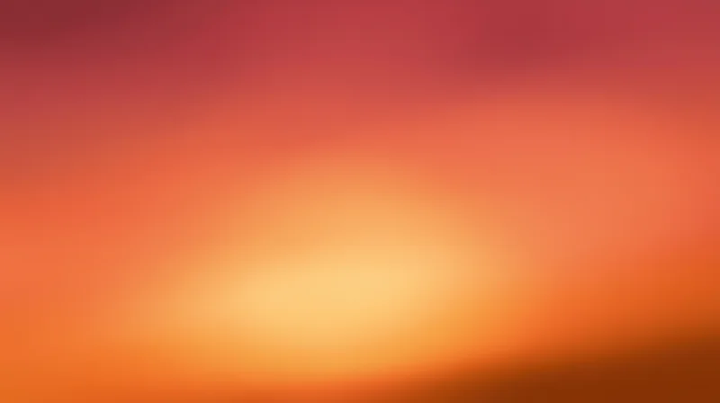 Smooth gradient of warm orange and pink hues blending across the frame