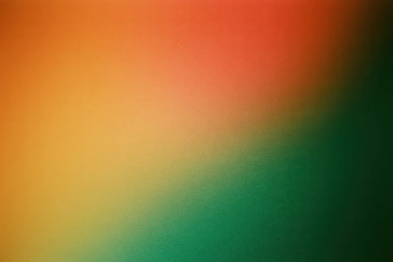 Smooth gradient background transitioning from orange to green with soft color blend