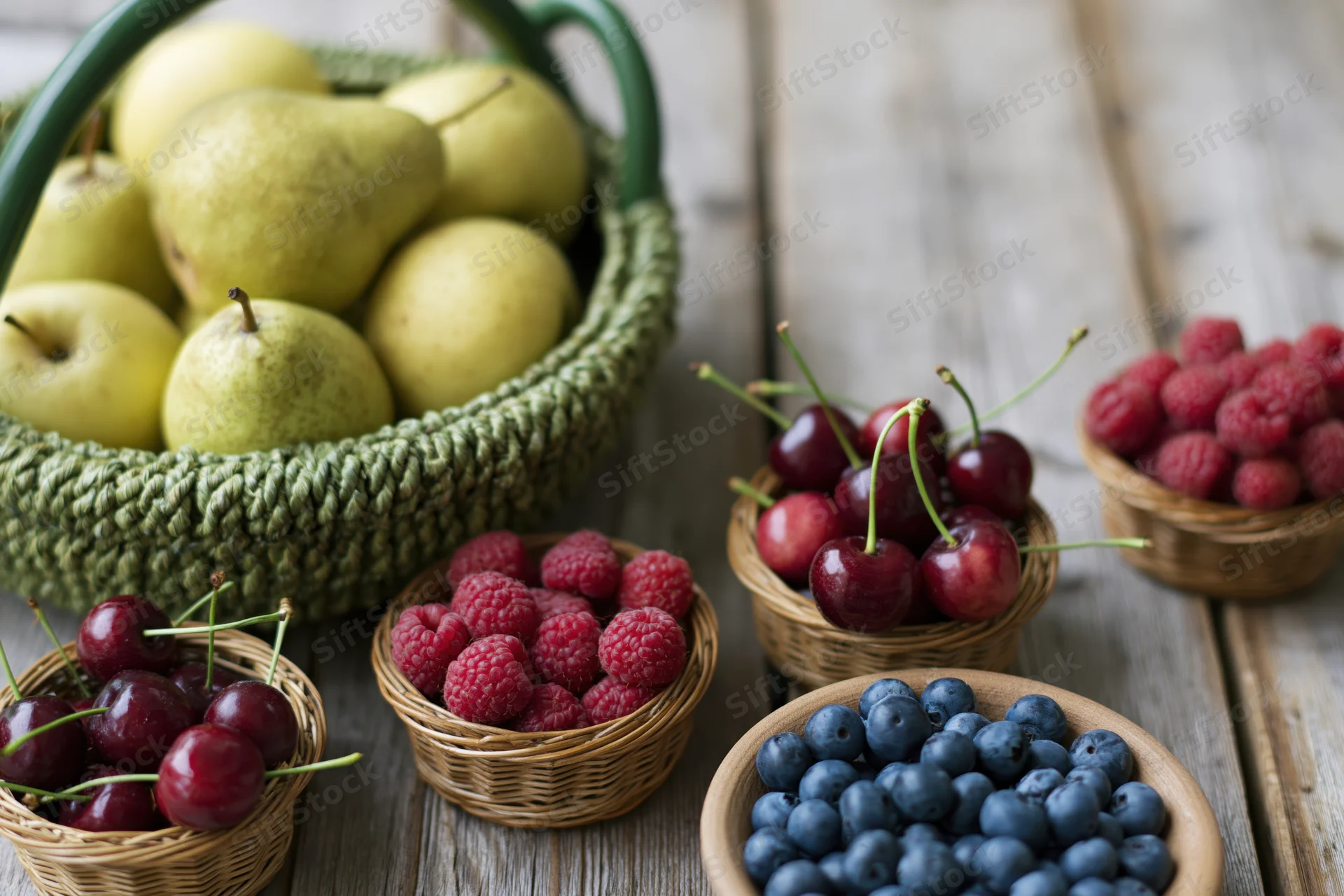 Assorted fresh fruit in woven baskets and small bowls on a wooden table