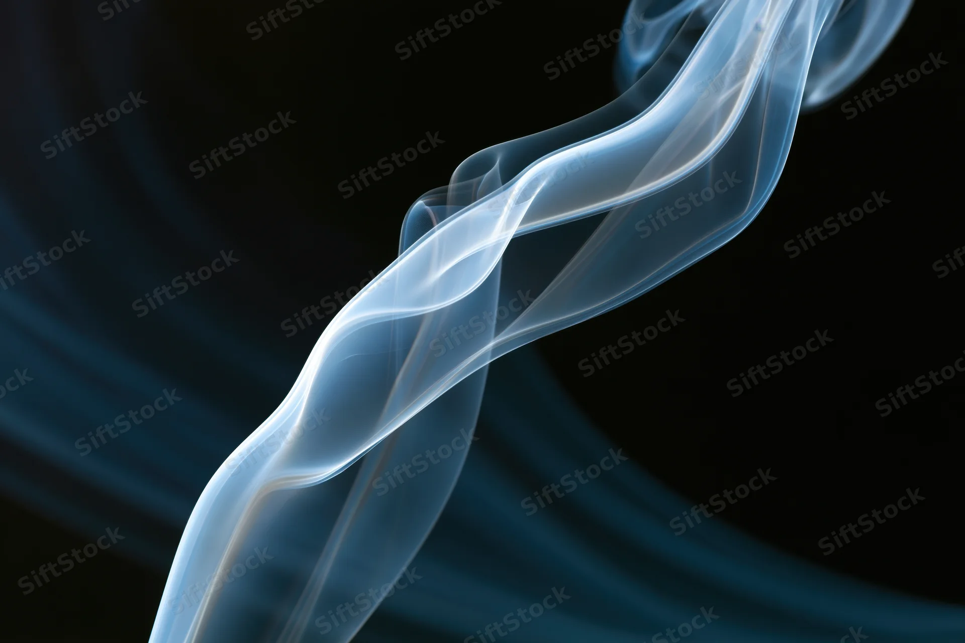 A thin wisp of smoke curling upward against a dark background