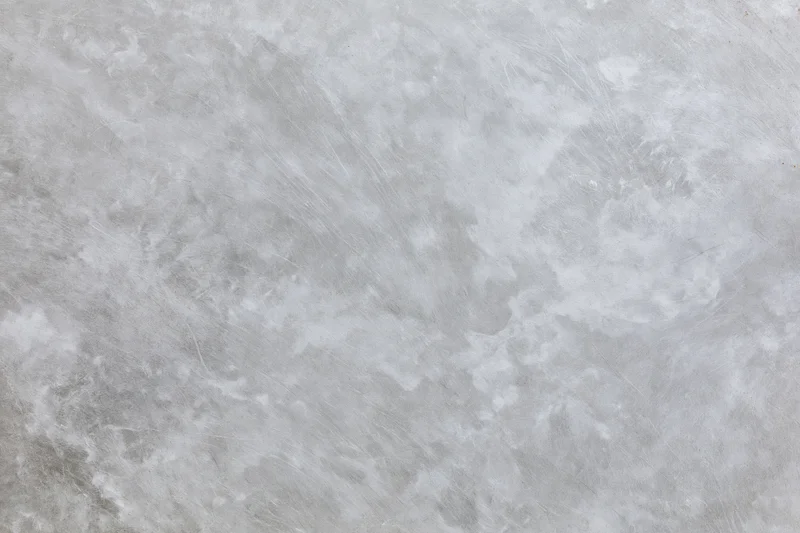 Close-up of a weathered gray concrete surface filling the frame