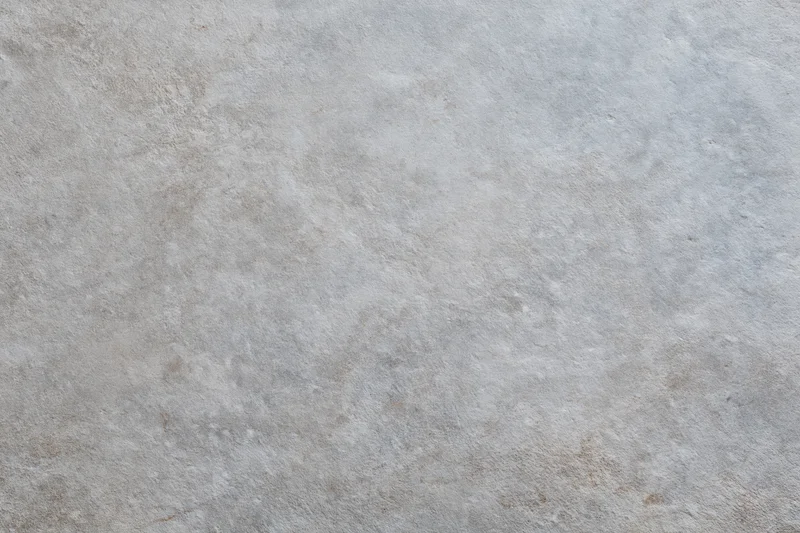 Close-up of a weathered concrete wall surface filling the frame