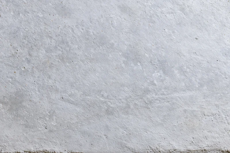 Textured concrete wall surface filling the frame