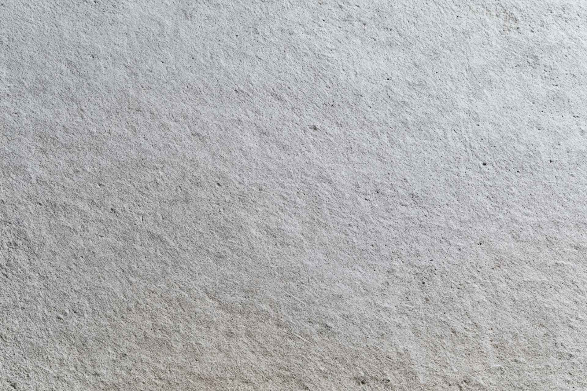 Flat concrete wall surface filling the frame