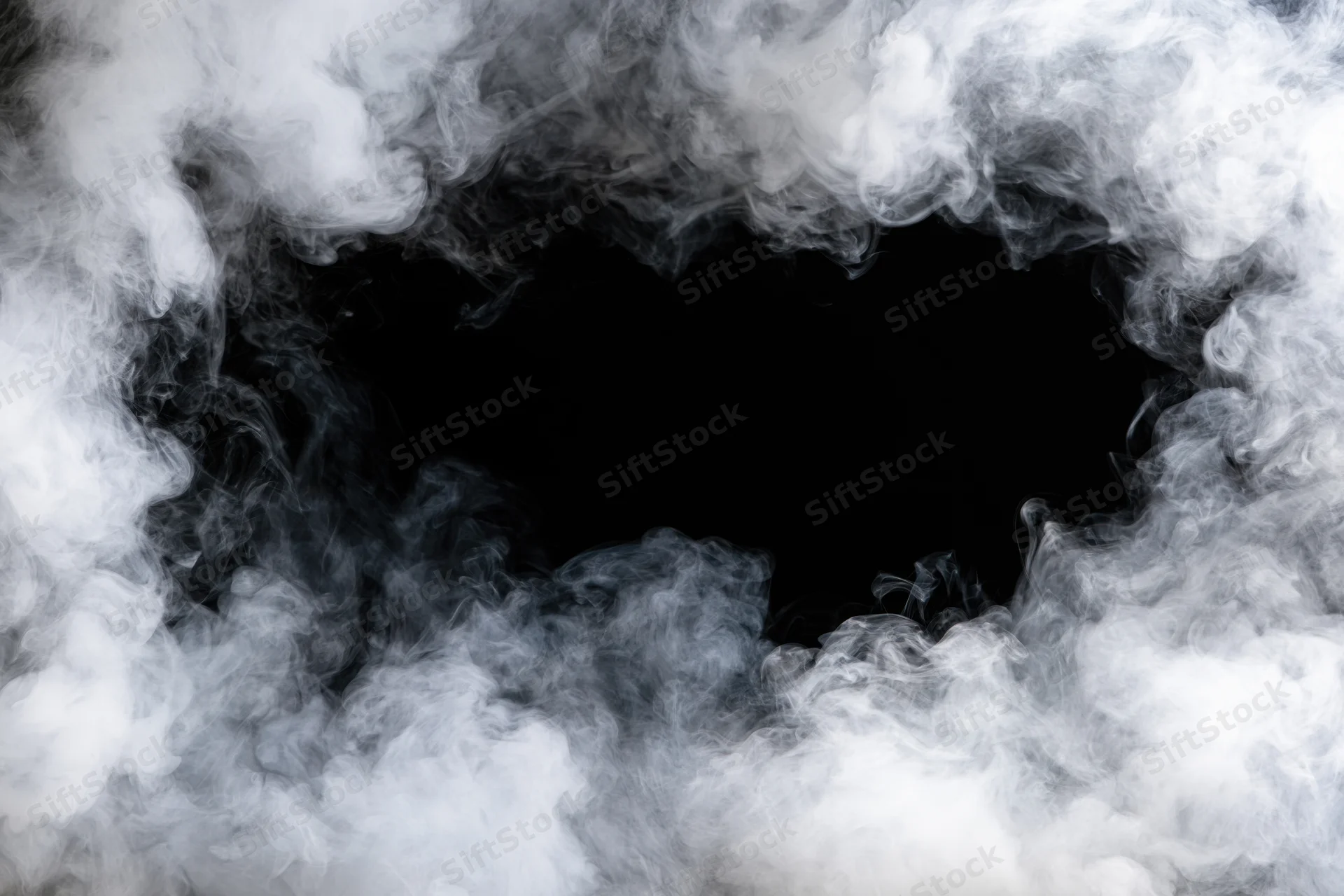White smoke swirling around a black circular opening in the center