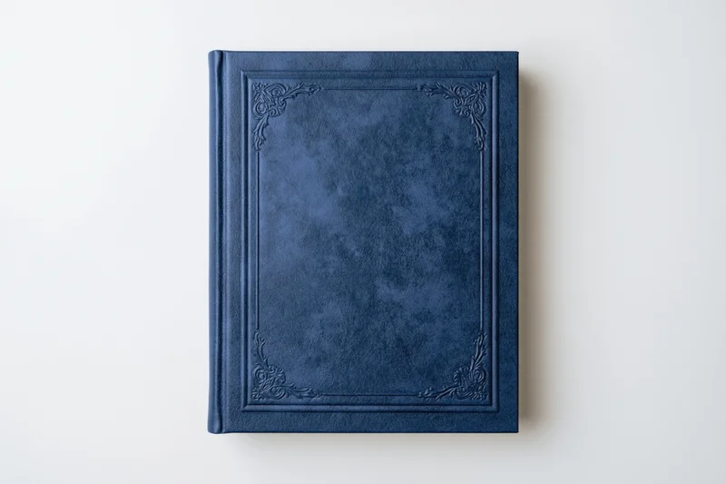 Closed hardcover book with a navy blue leather-textured cover