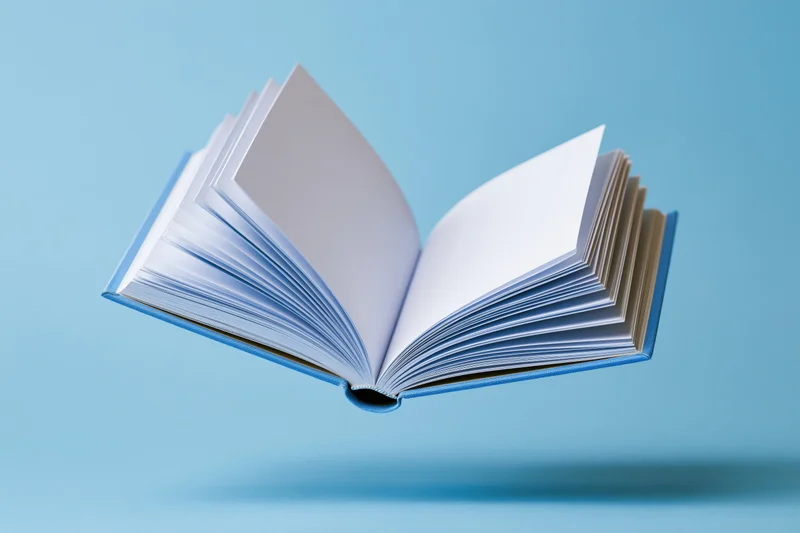 Open hardcover book floating midair with blank pages against blue background