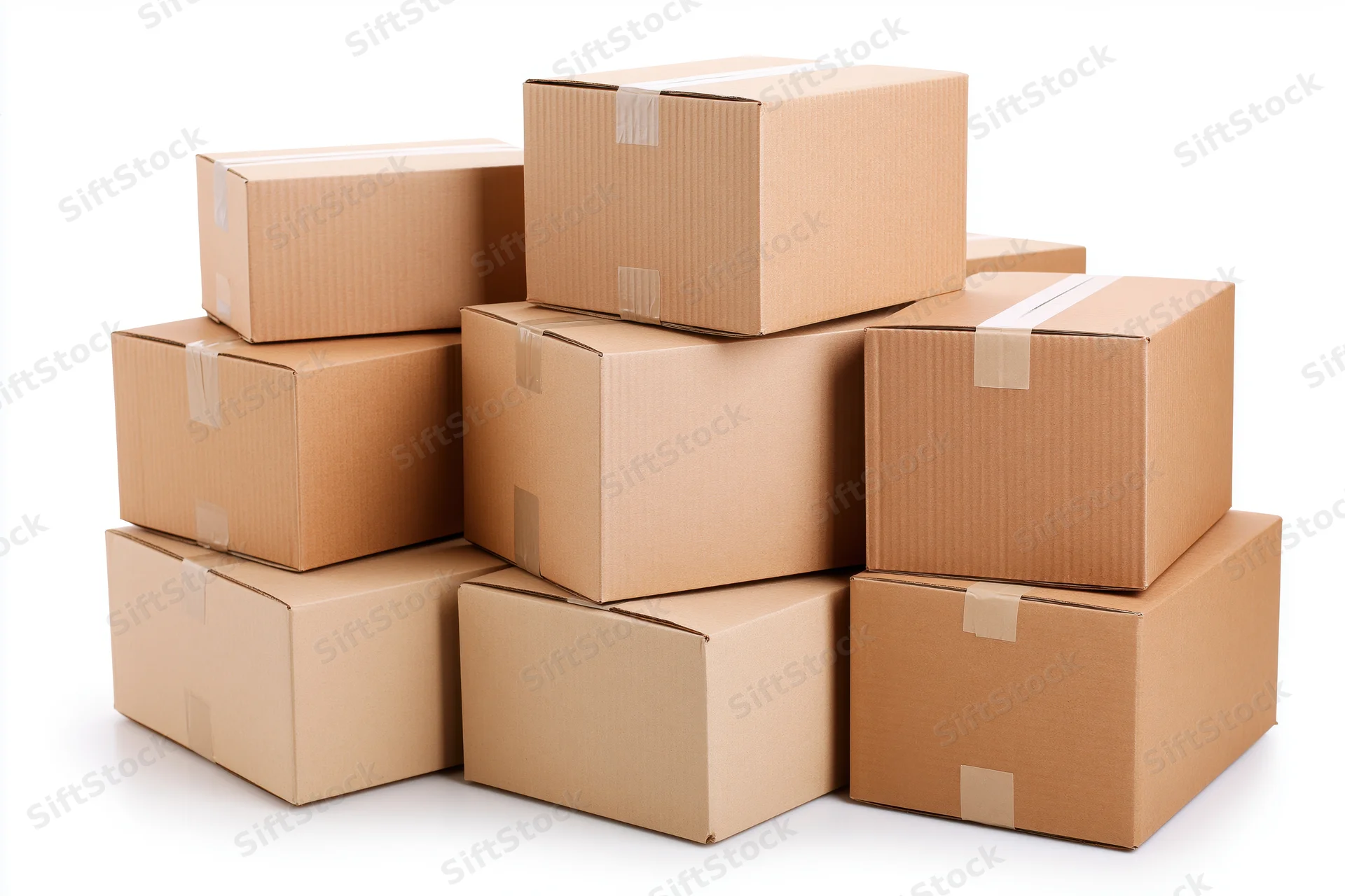 Stack of sealed cardboard shipping boxes arranged in a loose pile on white background