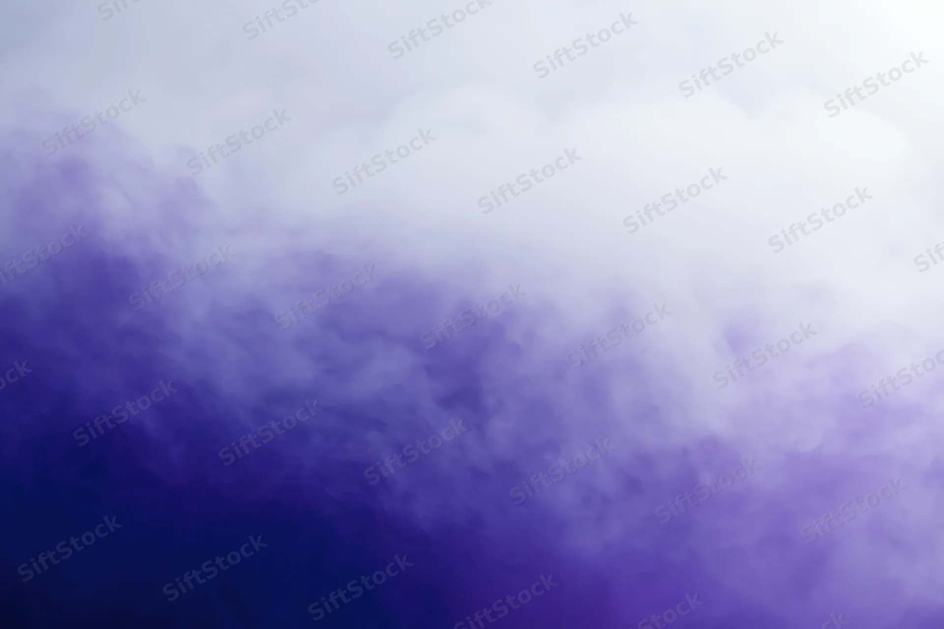 Swirling purple and blue smoke forming a gradient background