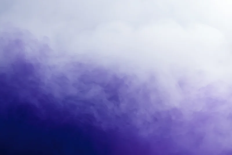 Swirling purple and blue smoke forming a gradient background