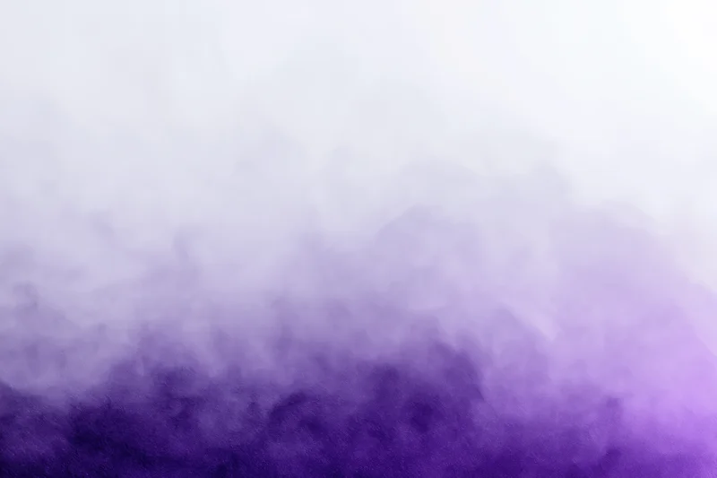 Purple and white smoke gradient filling the frame as an abstract background