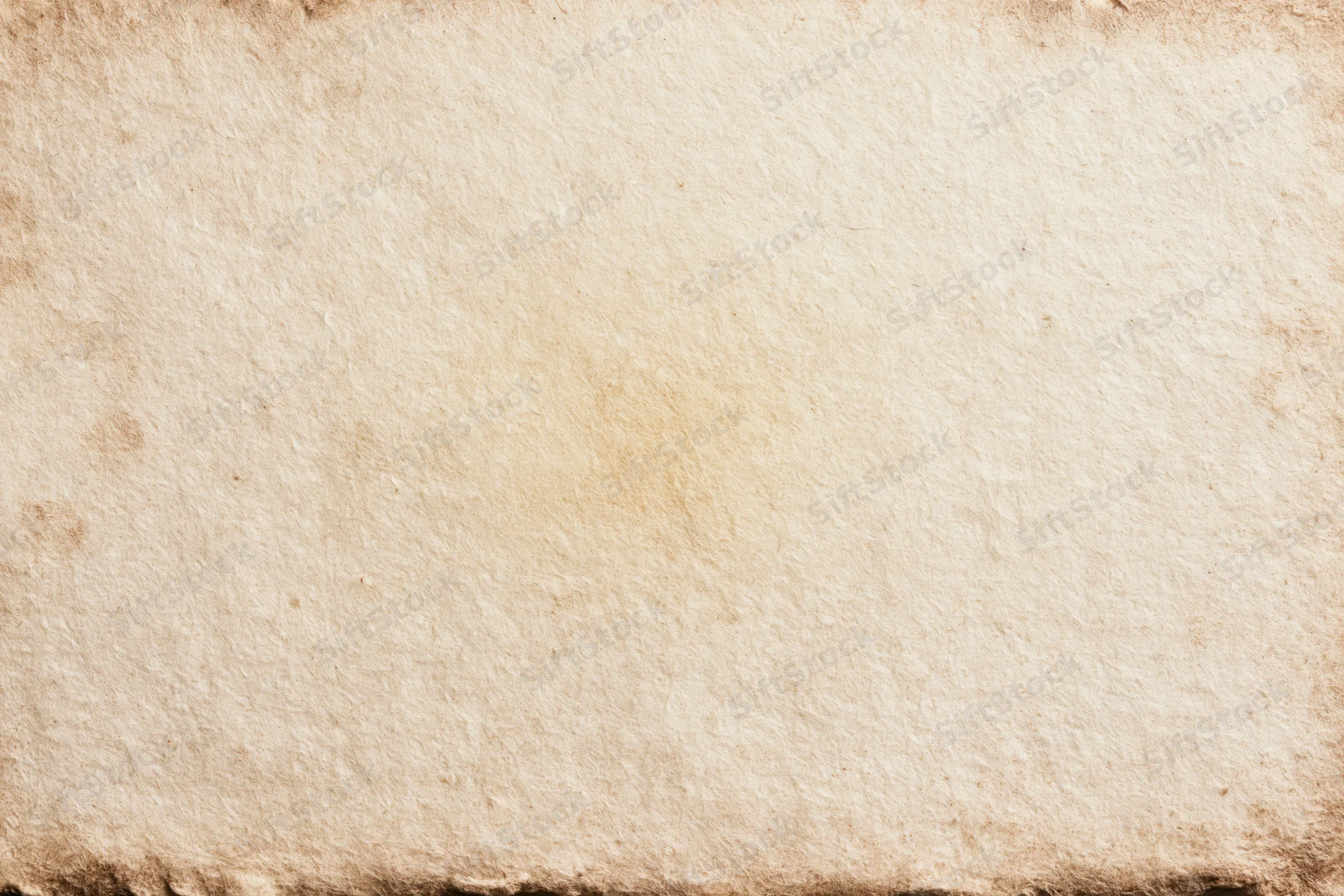 Aged paper sheet with textured surface and worn edges filling the frame