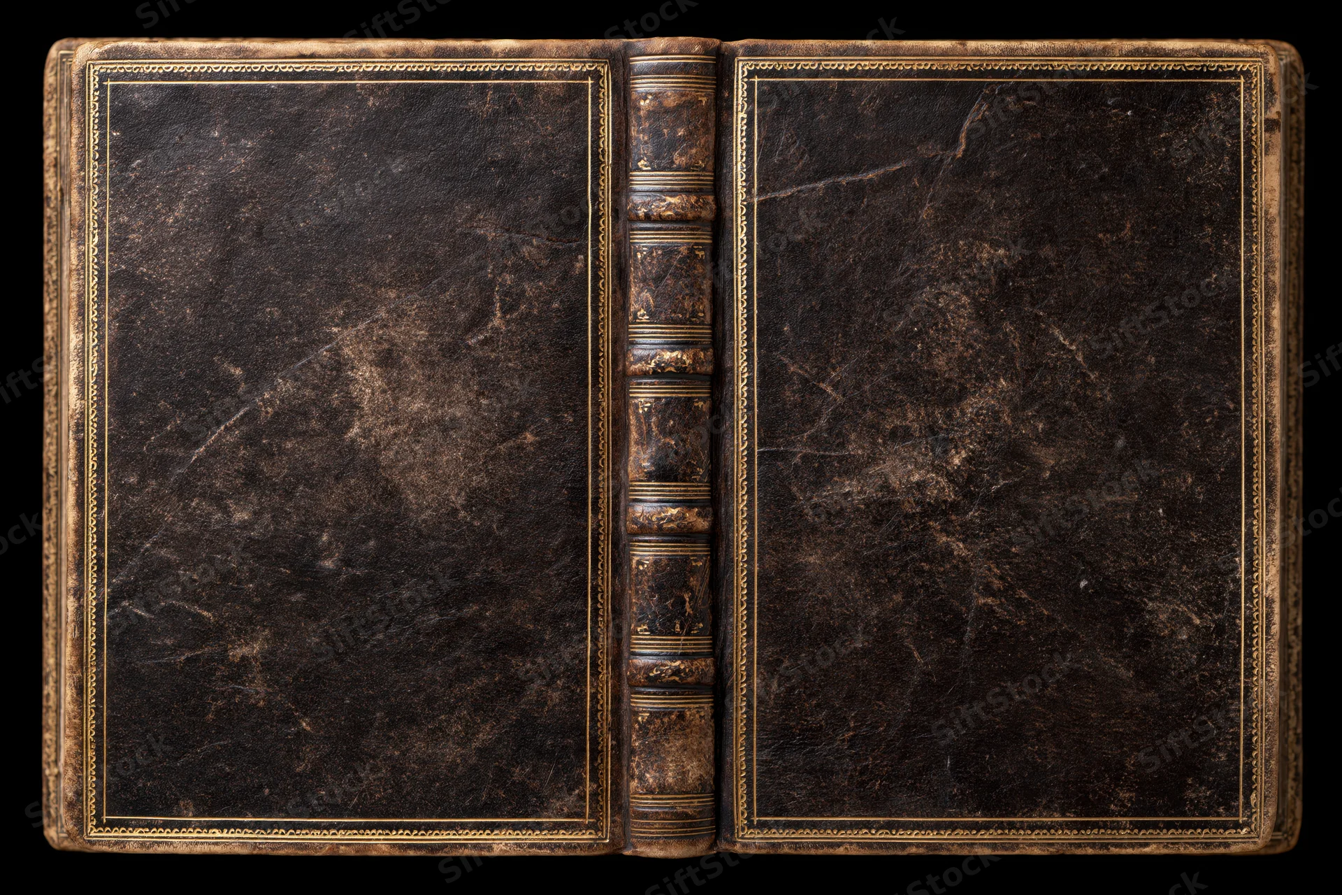Open antique leather-bound book laid flat showing both covers against black background