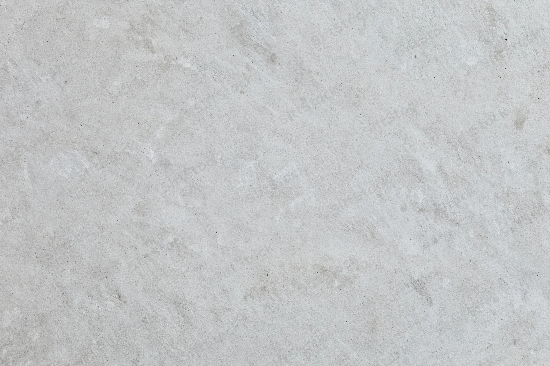 Textured concrete wall surface filling the frame