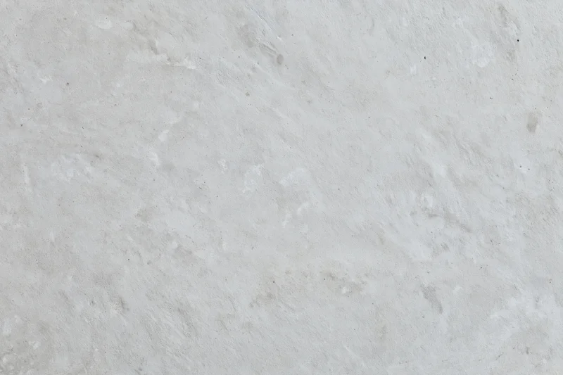 Textured concrete wall surface filling the frame