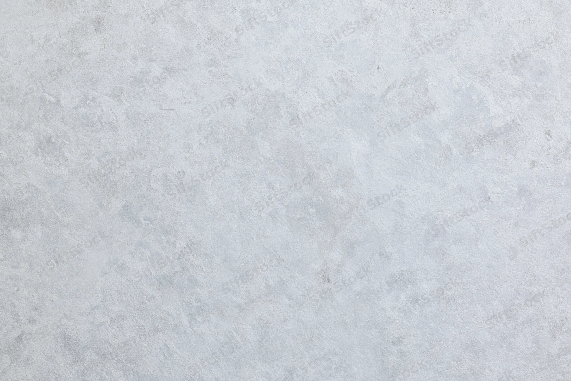 Textured concrete wall surface filling the frame