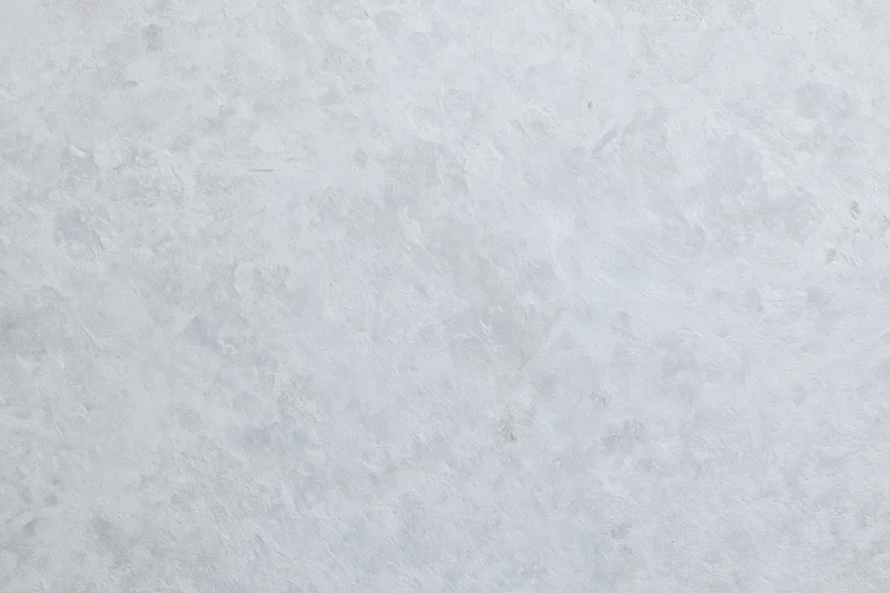 Textured concrete wall surface filling the frame