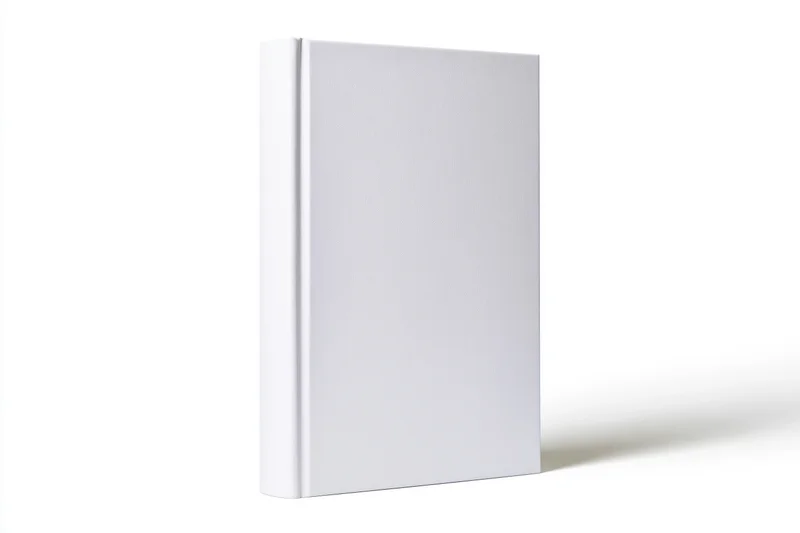 Blank white hardcover book standing upright on white background