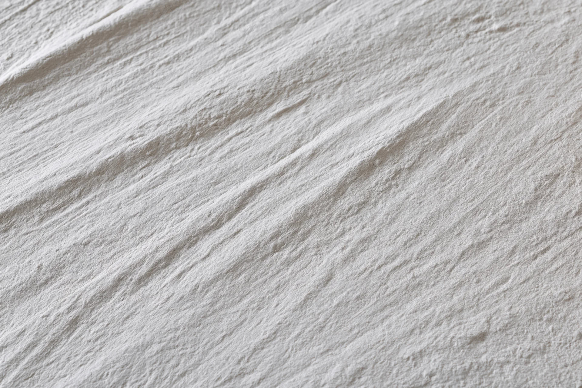 Close-up of rough textured concrete wall surface