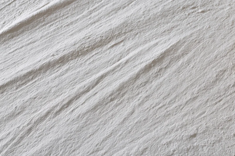 Close-up of rough textured concrete wall surface