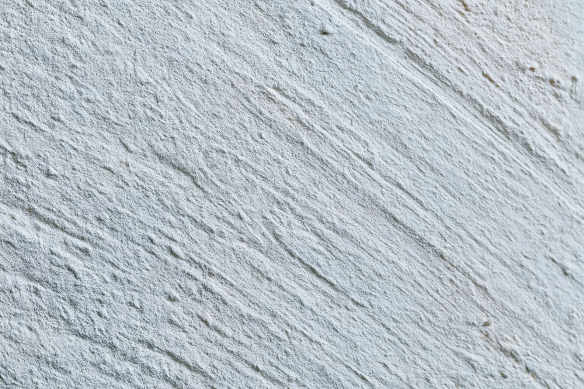 Close-up of rough textured concrete wall surface