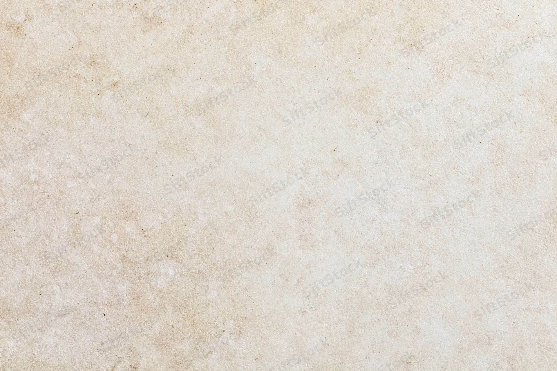 Close-up of smooth beige concrete wall surface with subtle texture and mottled finish