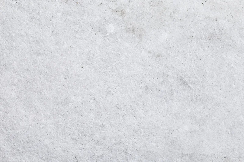 Close-up of a bare concrete wall surface filling the frame