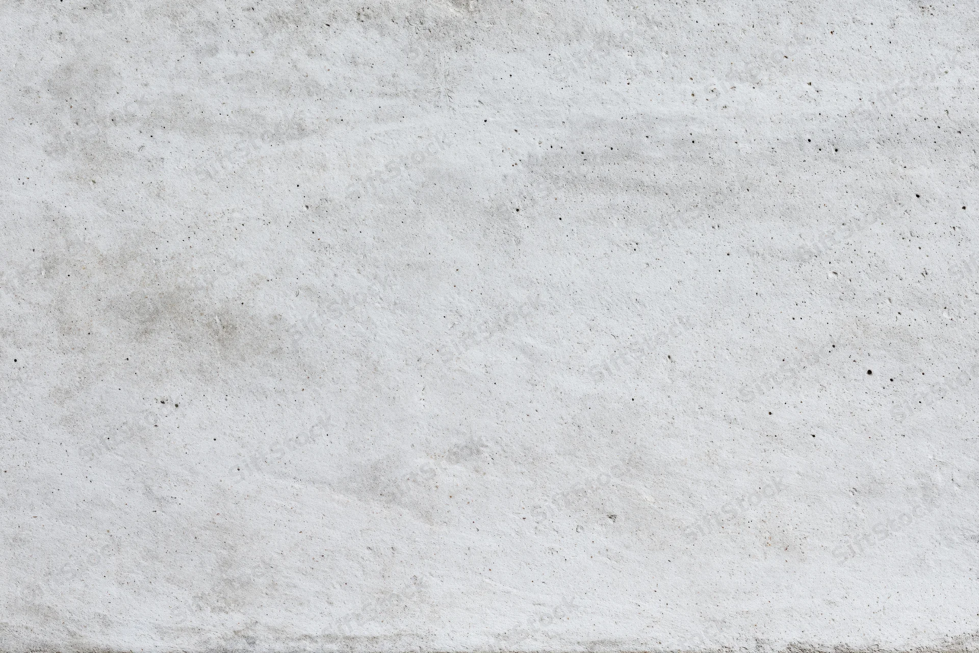 Close-up of a bare concrete wall surface filling the frame