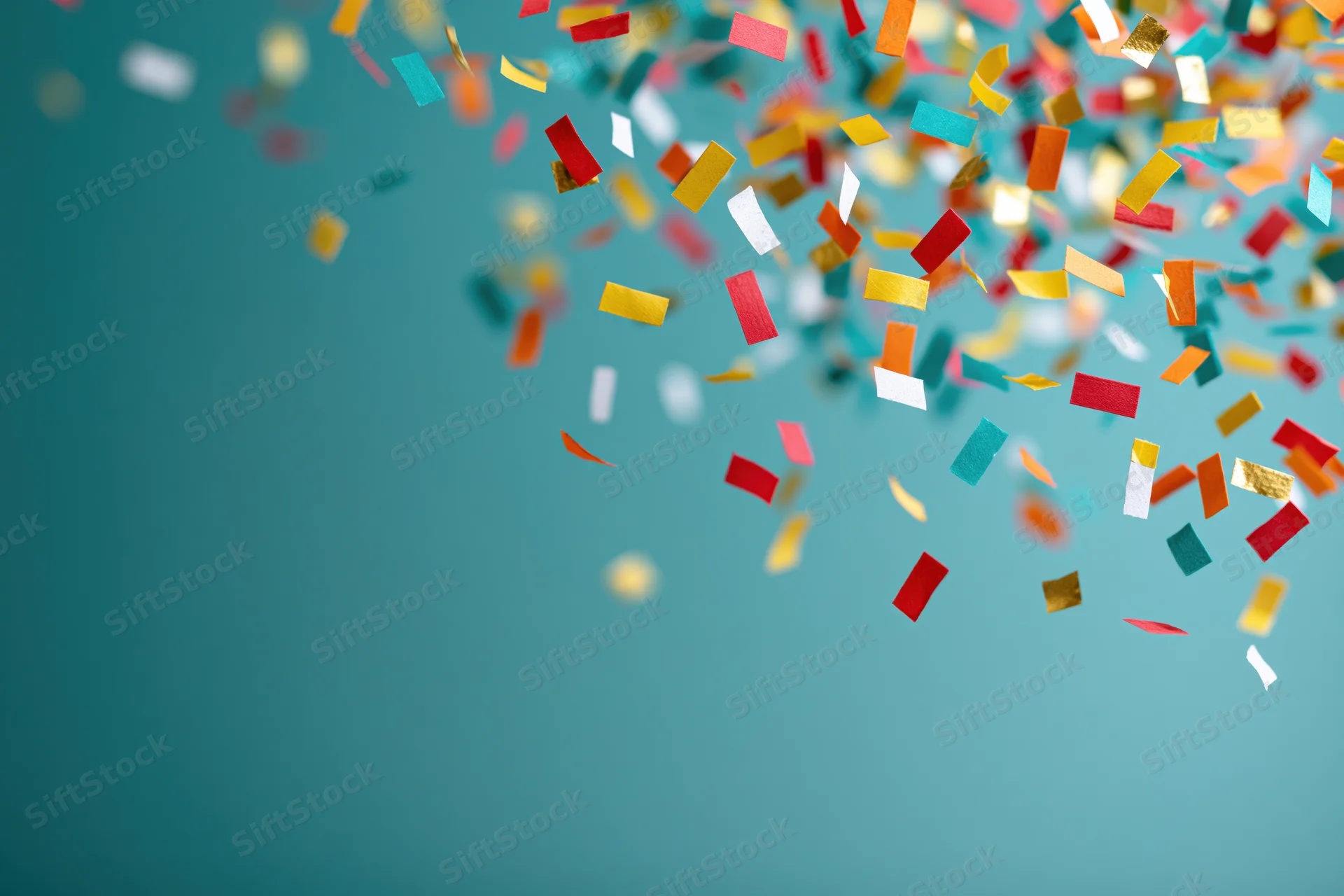Colorful paper confetti pieces falling across a teal background with copyspace on the left