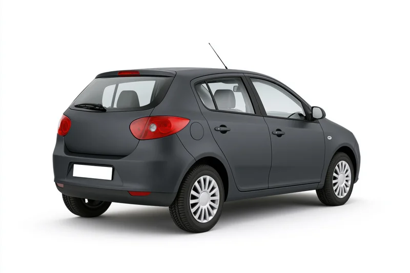 Dark charcoal grey compact hatchback viewed from rear on white background