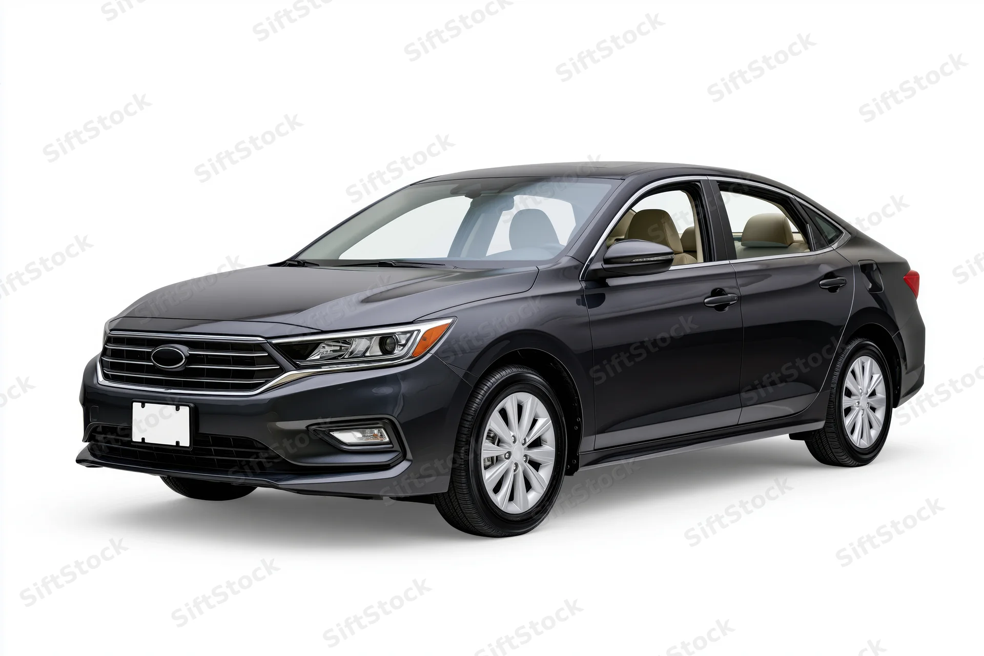 Dark charcoal grey ford sedan shown from threequarter front angle in studio setting