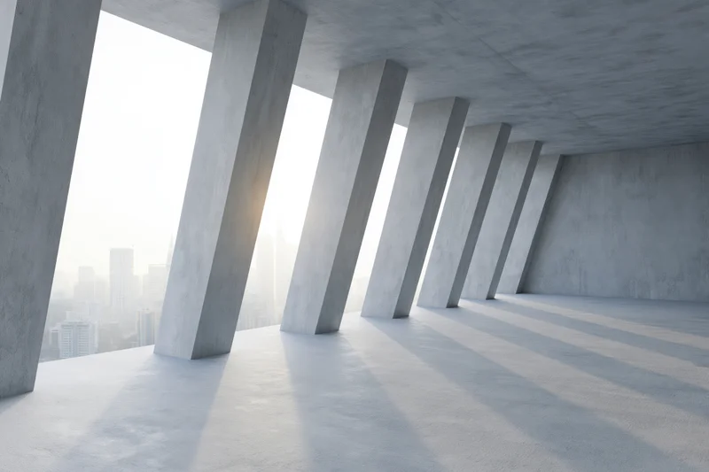 Raw concrete interior with diagonal columns overlooking city skyline