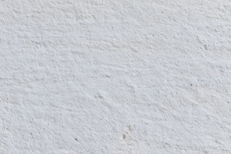 Close-up of a textured concrete wall surface filling the frame
