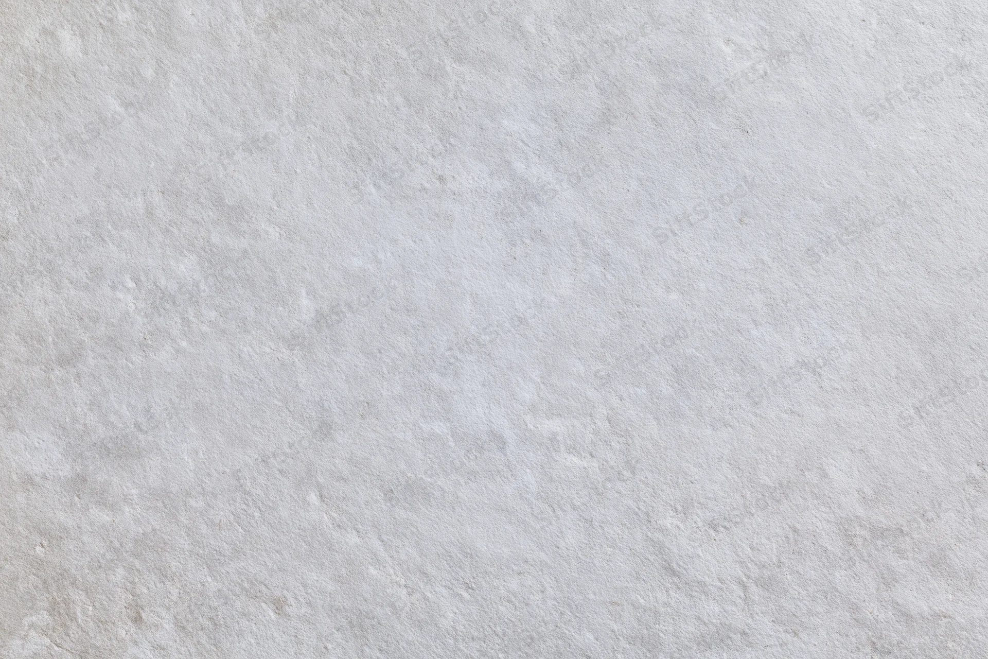 Close-up of a textured concrete wall surface filling the frame