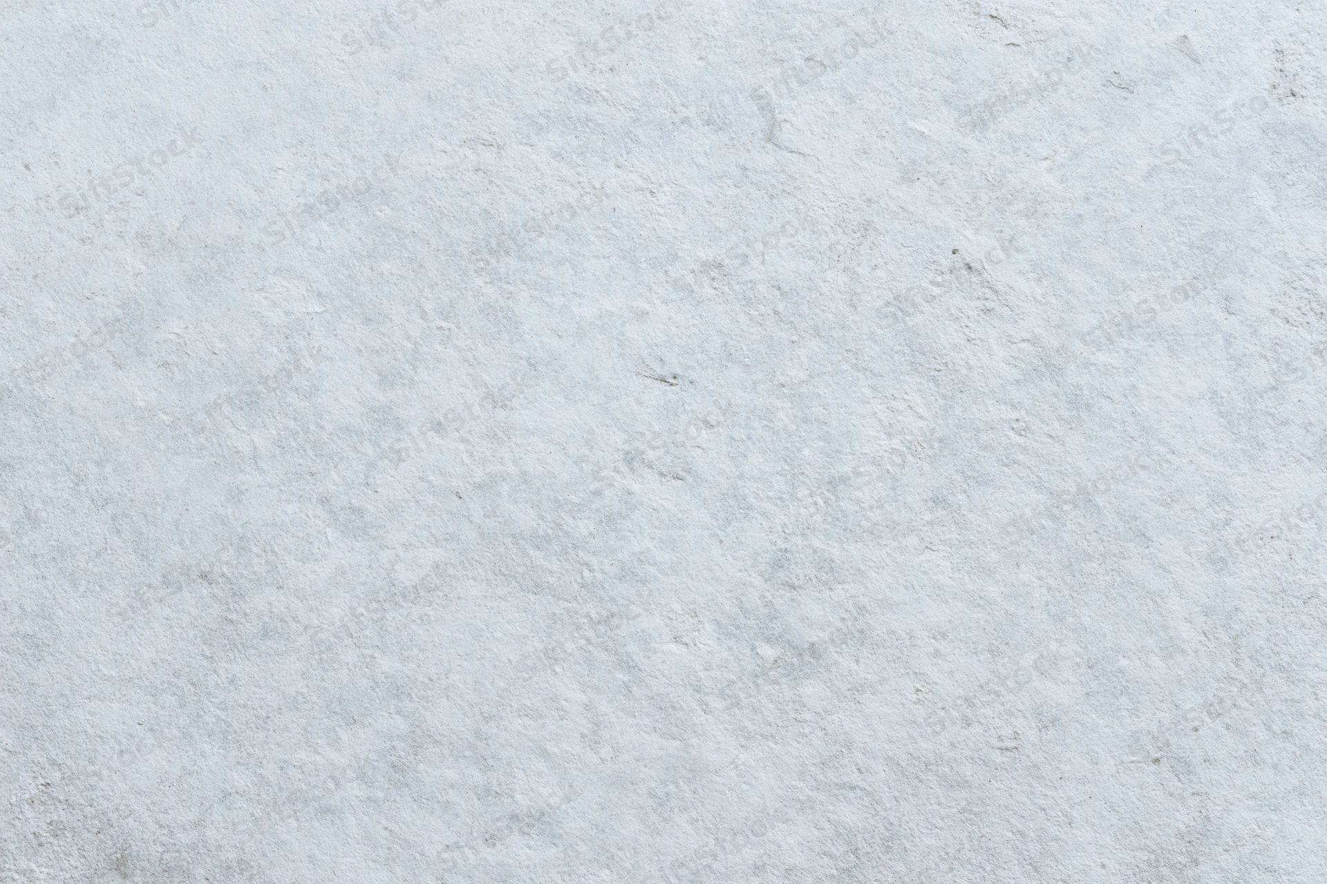 Textured concrete wall surface filling the frame