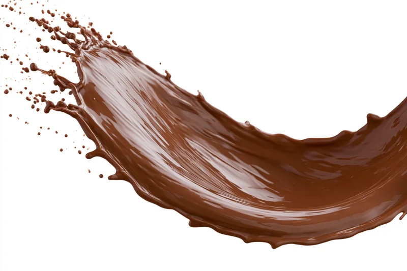Liquid chocolate splashing in dynamic arc frozen in motion against white background