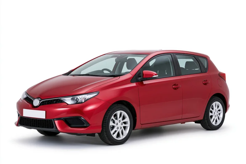 Red compact hatchback car in three-quarter front view on white background