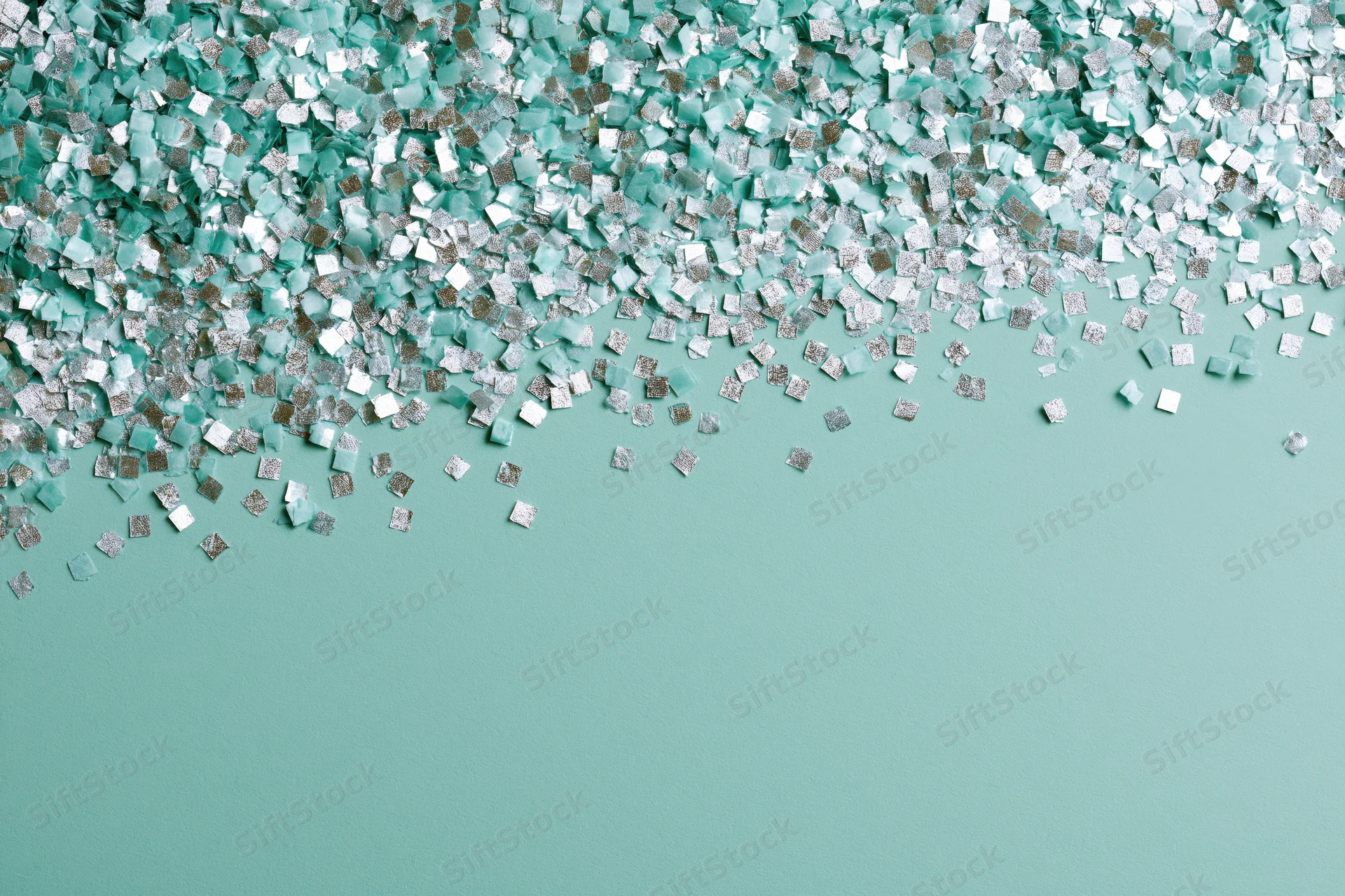 Square confetti pieces scattered densely at top on teal background with copyspace below