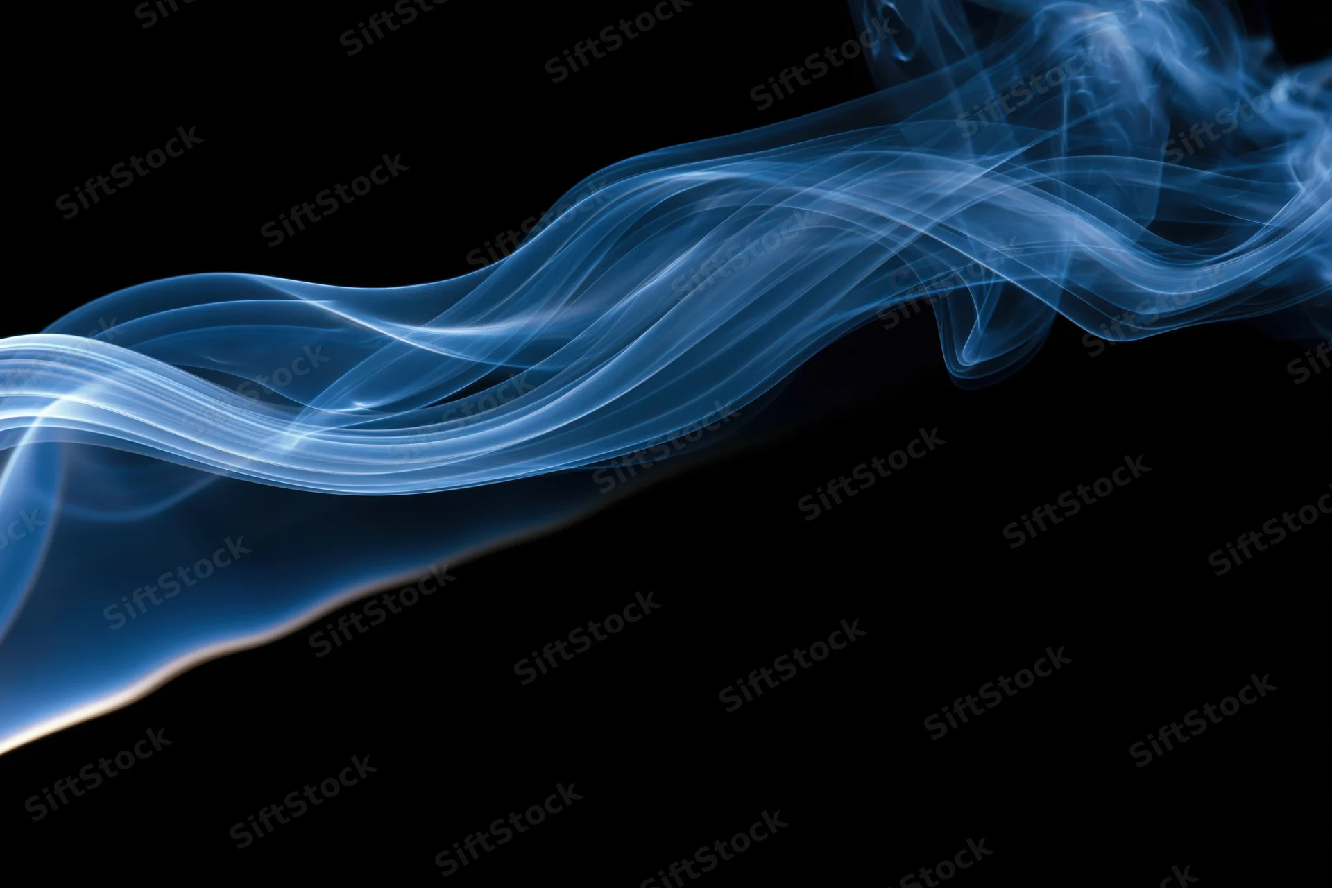 Blue wispy smoke plume drifting and curling in mid-air against black background
