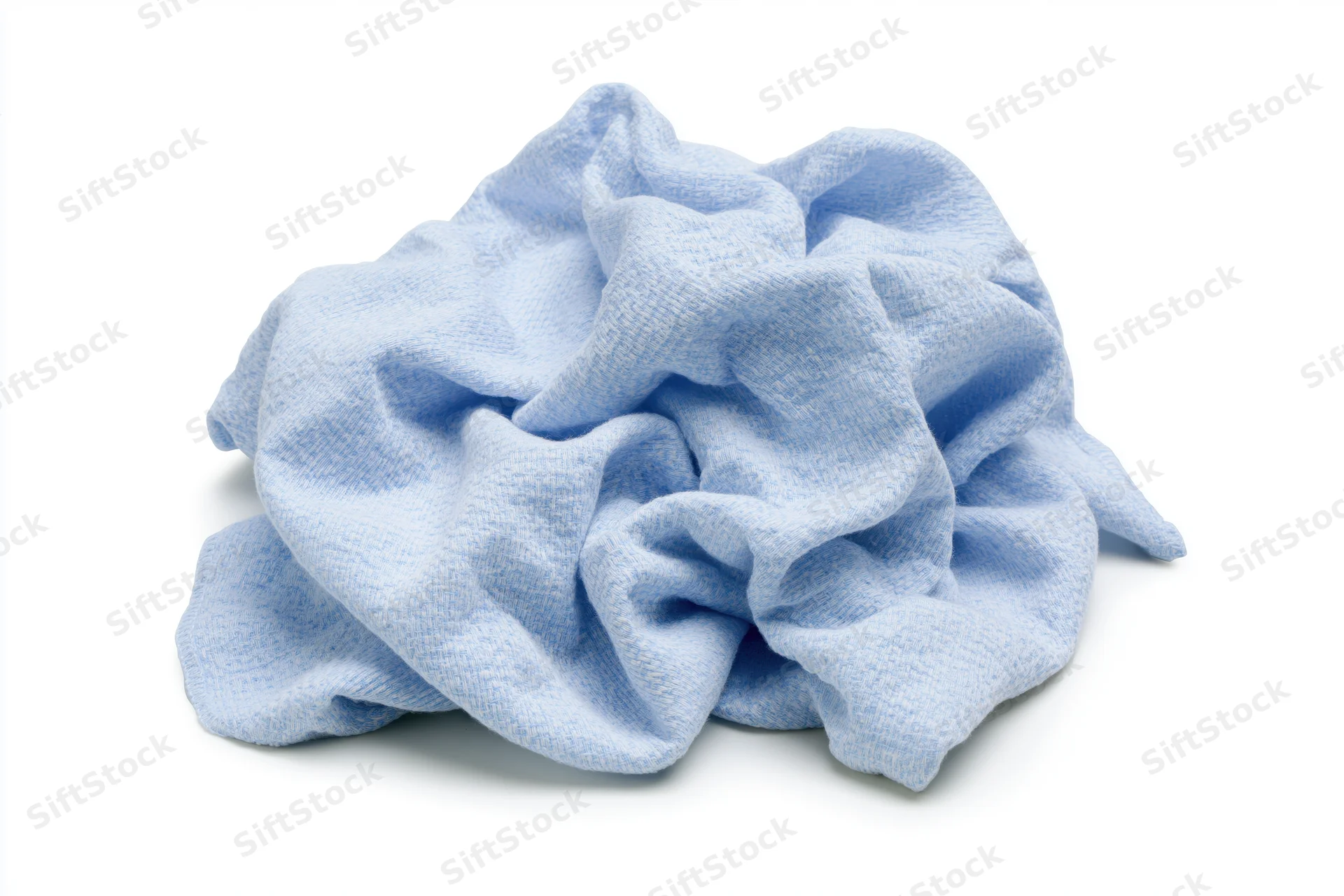 Crumpled light blue microfiber cleaning cloth on white background